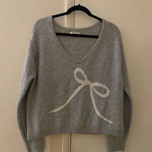 Gray Sweater with Bow Design